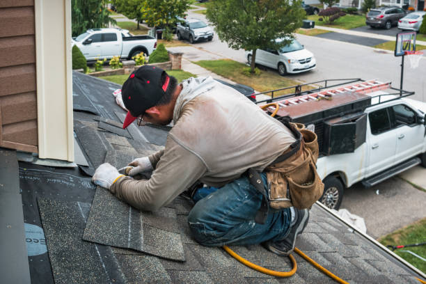 Professional Storm Damage Roof Repair technician working in Acton, MA